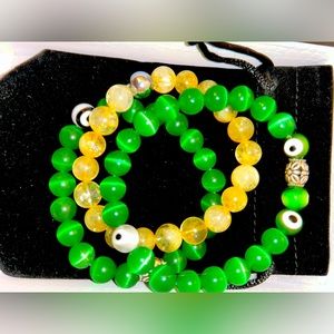 Green evil eye and citrine glass tigers eye hand made by me
